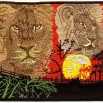 Embroiderd Patch with Lions and sunset in Africa Lions and sunset in Africa on the embroidered patch